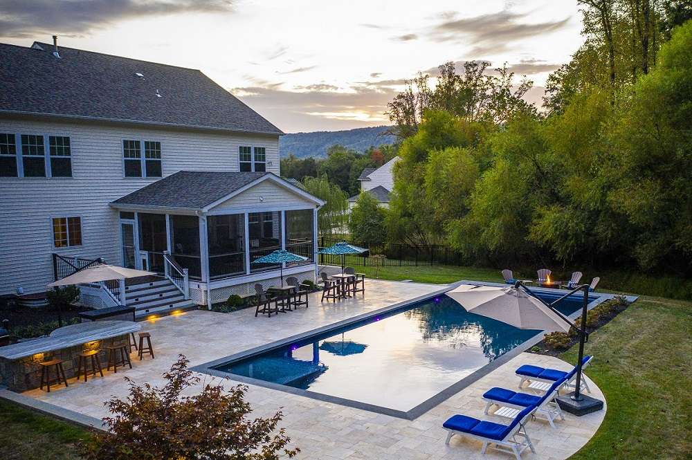 Loudoun County Pool Builders Create a Fun & Relaxing Backyard in Round